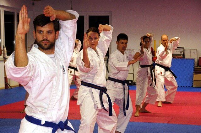 group of people training karate